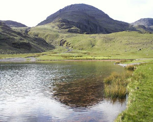 Styhead Tarn route to Langdale passes mid foreground